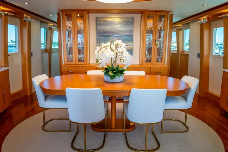 Serenity Yacht Photos Pics Luxurious dining area on a 2008 Lazzara Motor Yacht with elegant decor and modern furnishings.