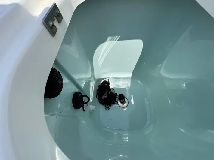 Bilboat Baggins Yacht Photos Pics Interior view of a 2011 Boston Whaler 305 Conquest boat compartment.