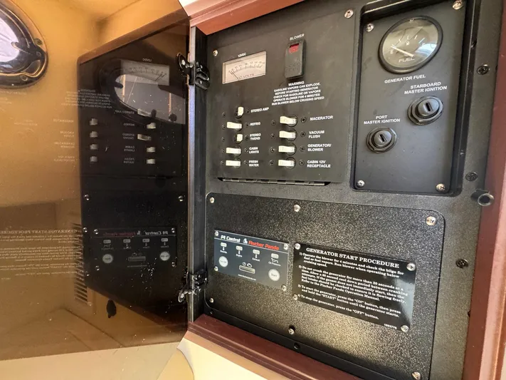 Bilboat Baggins Yacht Photos Pics Electrical control panel inside a 2011 Boston Whaler 305 Conquest boat.