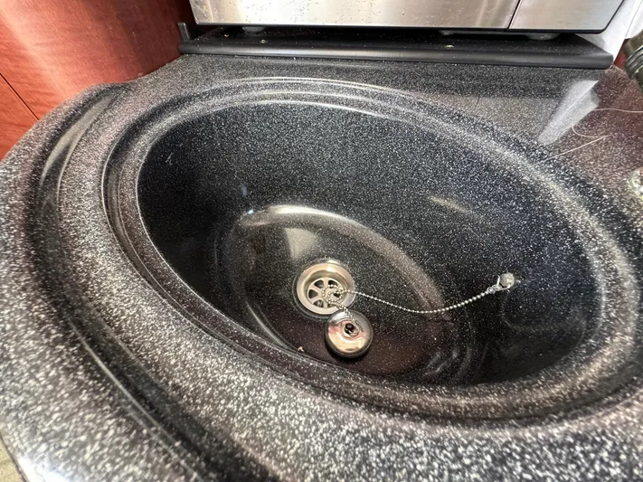 Bilboat Baggins Yacht Photos Pics Black speckled sink in 2011 Boston Whaler 305 Conquest boat.