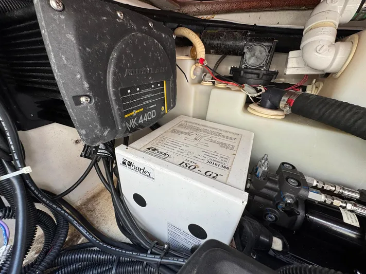 Bilboat Baggins Yacht Photos Pics Engine compartment of a 2011 Boston Whaler 305 Conquest with electrical components.