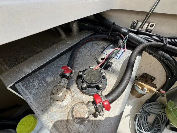Bilboat Baggins Yacht Photos Pics Engine compartment of a 2011 Boston Whaler 305 Conquest with visible wiring and components.