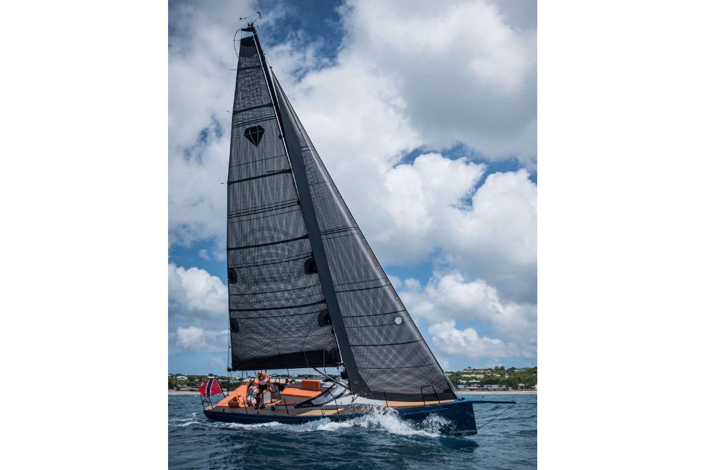 2026 Saffier SE 33 Life sailboat on open water under a cloudy sky.