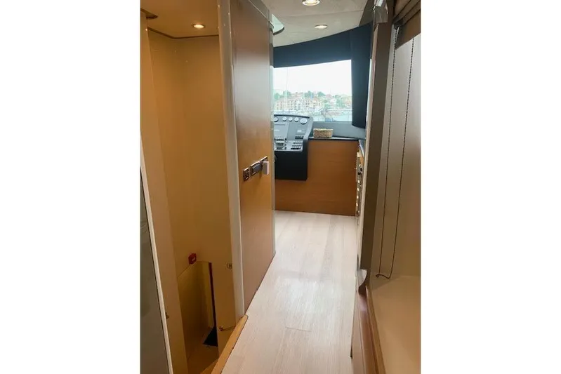  Yacht Photos Pics Interior view of 2012 Huzur Yachts 78, featuring a sleek hallway and control panel.