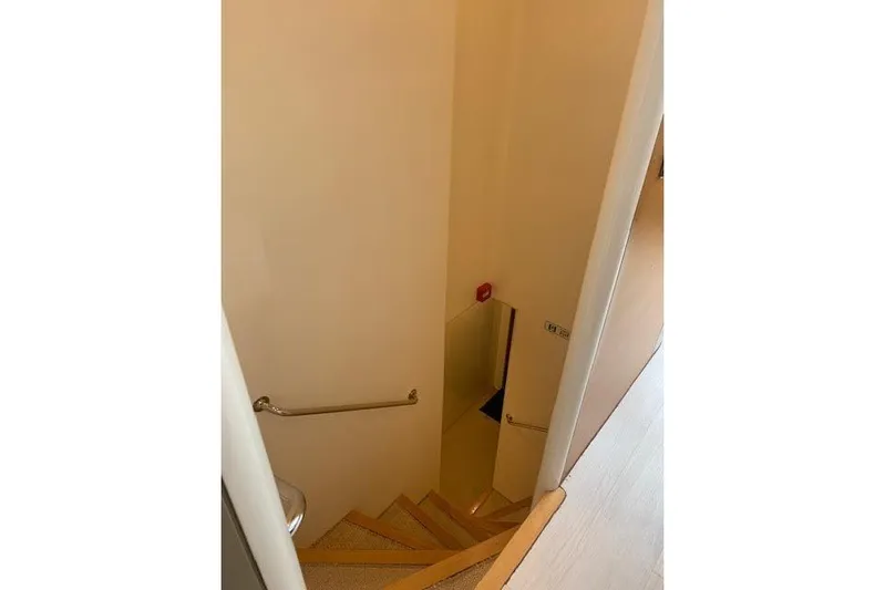  Yacht Photos Pics Staircase inside 2012 Huzur Yachts 78, featuring sleek design and handrail.