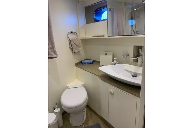  Yacht Photos Pics Bathroom interior of 2012 Huzur Yachts 78, featuring modern sink and toilet.