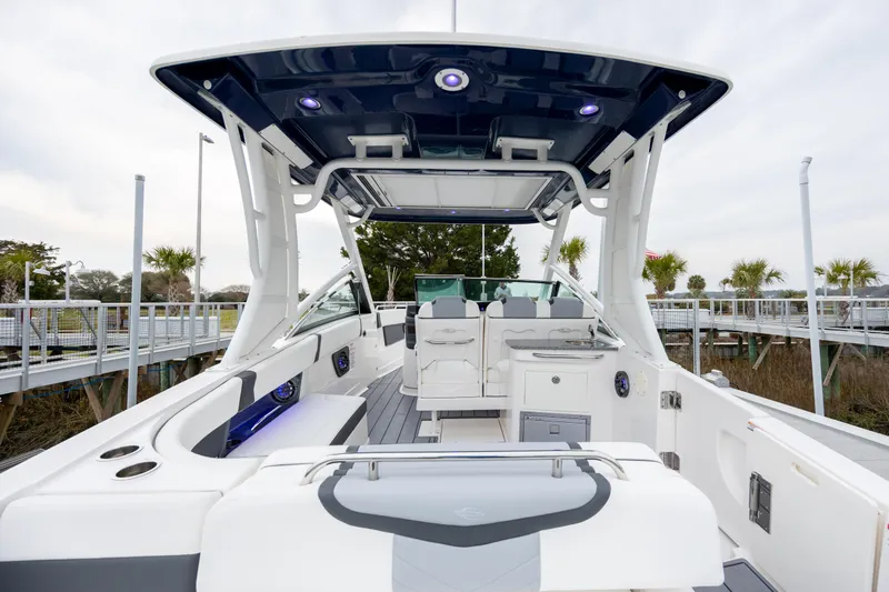  Yacht Photos Pics 2023 Chaparral 280 OSX boat interior with sleek design and modern amenities.