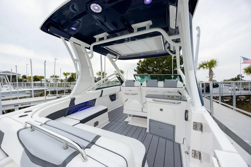  Yacht Photos Pics 2023 Chaparral 280 OSX boat interior with sleek seating and modern design.