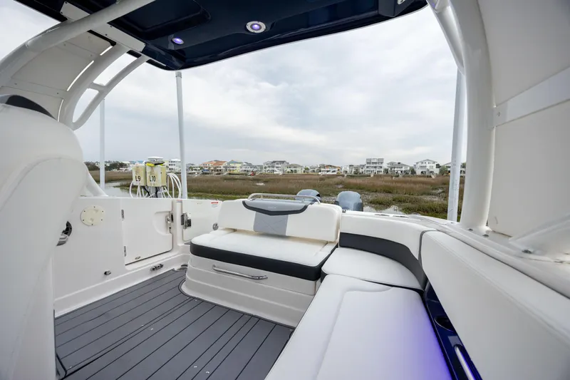  Yacht Photos Pics 2023 Chaparral 280 OSX boat interior with sleek seating and modern design.