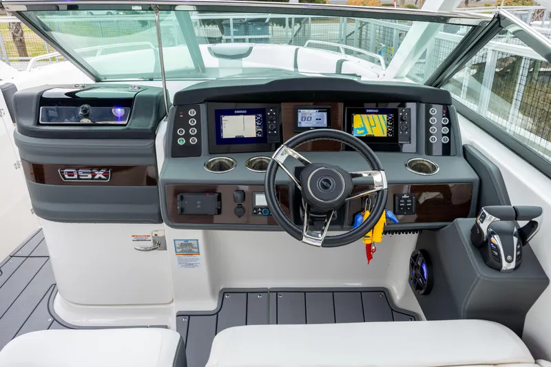  Yacht Photos Pics 2023 Chaparral 280 OSX boat dashboard with modern controls and navigation displays.
