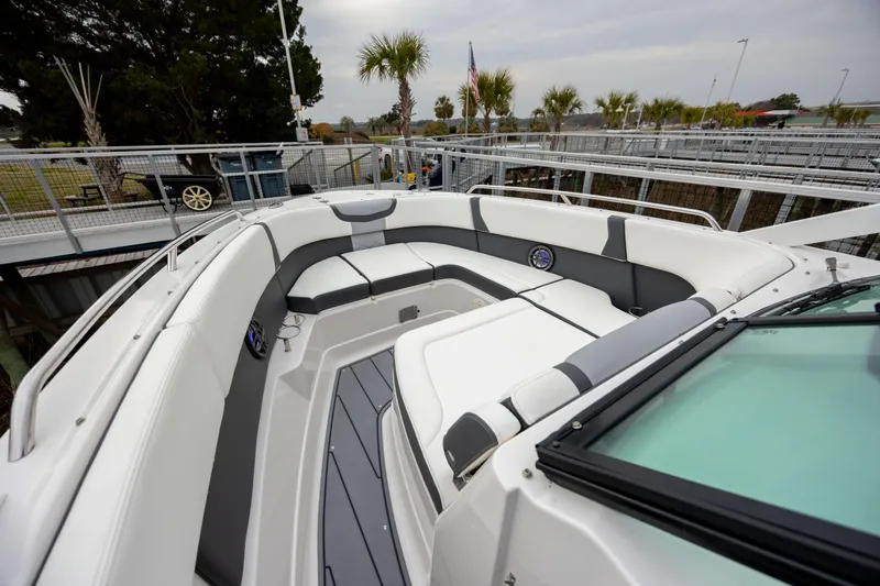  Yacht Photos Pics 2023 Chaparral 280 OSX boat interior with spacious seating and modern design.