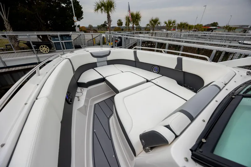  Yacht Photos Pics 2023 Chaparral 280 OSX boat interior with spacious seating and modern design.