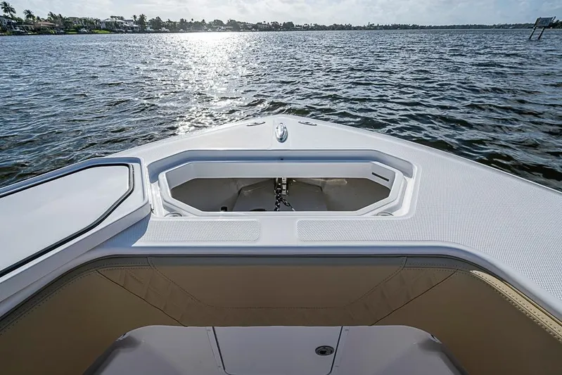 Rippleffect Yacht Photos Pics Bow view of 2023 Invincible 33 Open Fisherman on calm water.