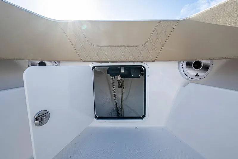 Rippleffect Yacht Photos Pics 2023 Invincible 33 Open Fisherman anchor locker with open hatch and speakers.