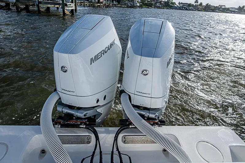 Rippleffect Yacht Photos Pics Twin Mercury Verado engines on 2023 Invincible 33 Open Fisherman boat, dockside view.