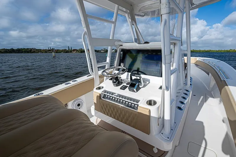 Rippleffect Yacht Photos Pics 2023 Invincible 33 Open Fisherman boat interior with modern helm and seating.