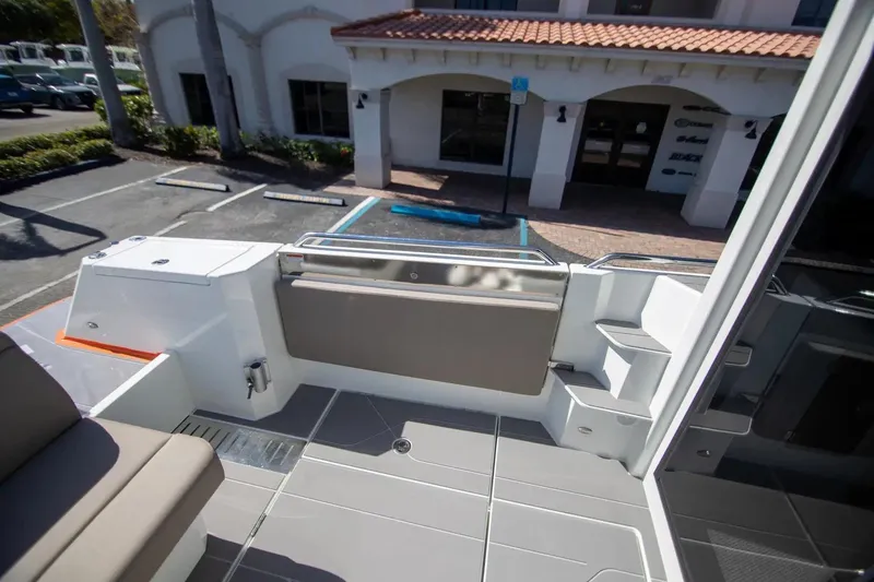  Yacht Photos Pics 2025 Quarken 35 Cabin boat interior with modern seating and sleek design.