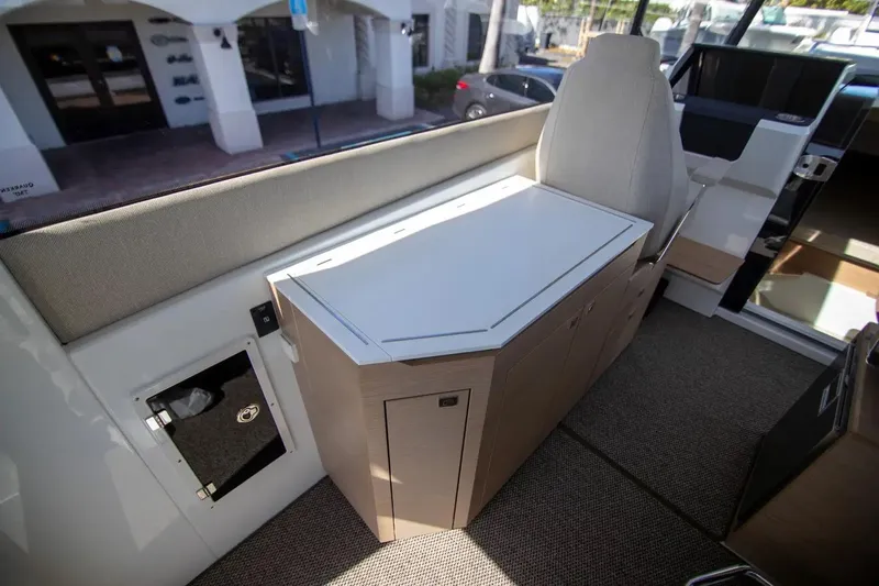 Yacht Photos Pics Interior of 2025 Quarken 35 Cabin boat, featuring sleek seating and modern design elements.