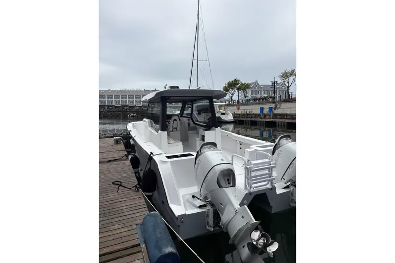 Hammercat 35hh Yacht Photos Pics 2026 Hammer Yachts 35HH docked, showcasing sleek design and powerful engines.