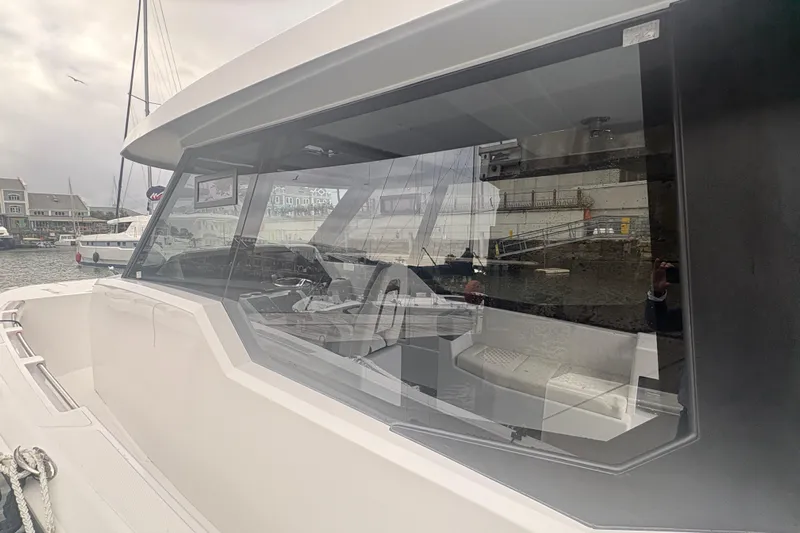 Hammercat 35hh Yacht Photos Pics 2026 Hammer Yachts 35HH, sleek design, modern interior, docked at marina.