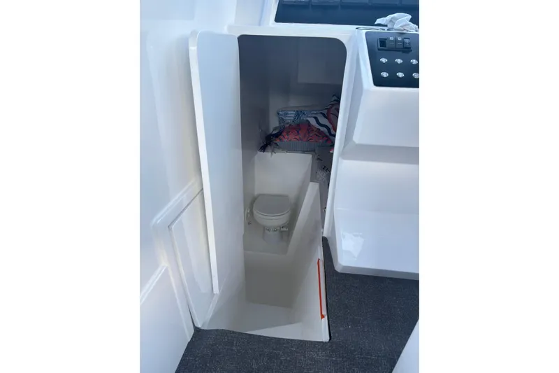 Hammercat 35hh Yacht Photos Pics Interior of 2026 Hammer Yachts 35HH, featuring a compact cabin with a toilet.