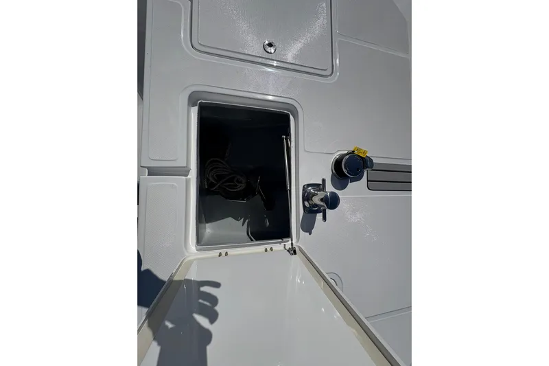 Hammercat 35hh Yacht Photos Pics Open storage compartment on 2026 Hammer Yachts 35HH deck, featuring sleek design and modern fittings.