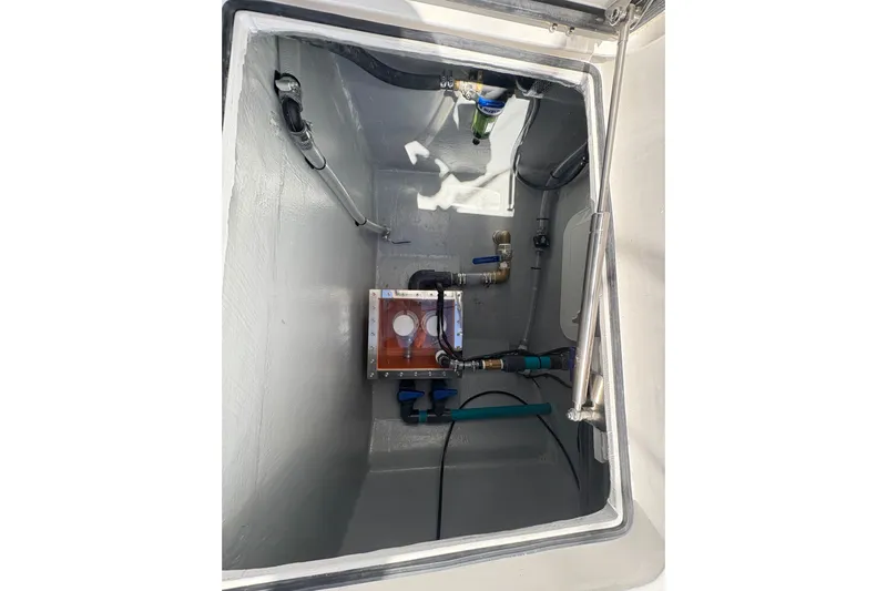 Hammercat 35hh Yacht Photos Pics Interior view of Hammer Yachts 35HH 2026 yacht compartment with visible plumbing and fittings.