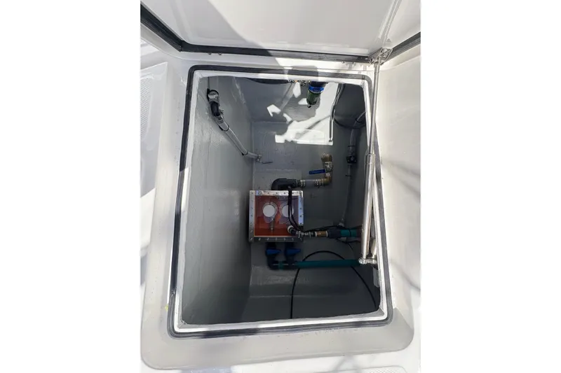 Hammercat 35hh Yacht Photos Pics Open hatch of 2026 Hammer Yachts 35HH, revealing internal components and piping.