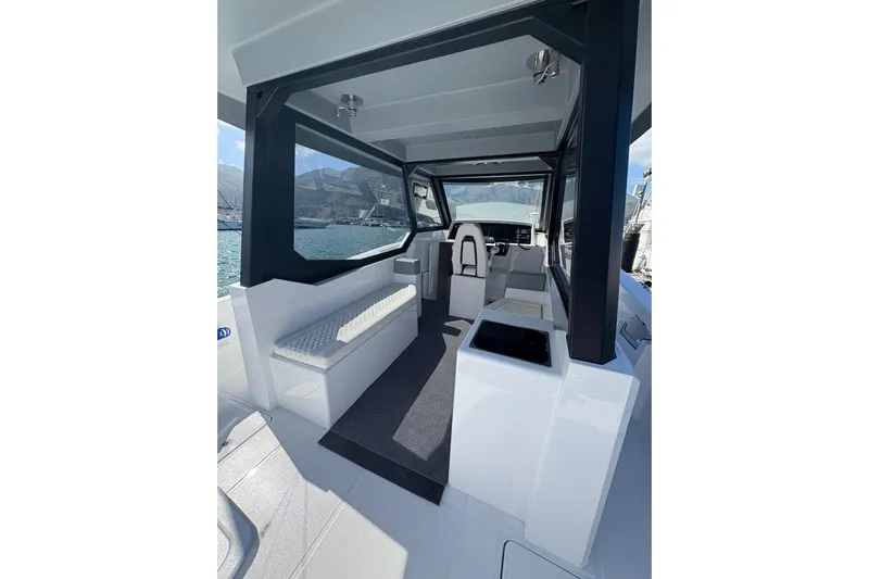 Hammercat 35hh Yacht Photos Pics Interior of 2026 Hammer Yachts 35HH, featuring modern seating and panoramic windows.