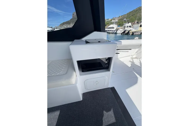 Hammercat 35hh Yacht Photos Pics Interior of 2026 Hammer Yachts 35HH, featuring sleek white seating and modern design.