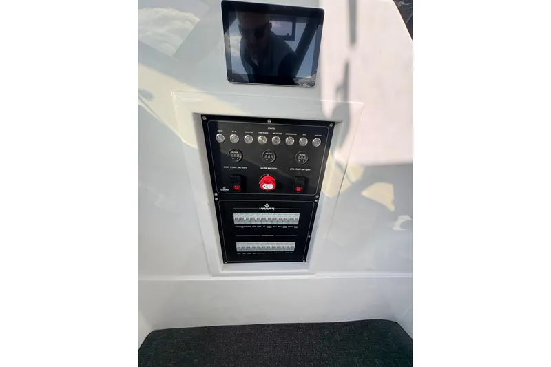 Hammercat 35hh Yacht Photos Pics Control panel of 2026 Hammer Yachts 35HH, featuring switches and display screen.