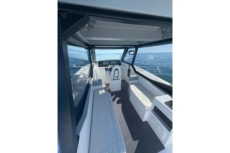 Hammercat 35hh Yacht Photos Pics Interior of 2026 Hammer Yachts 35HH, featuring modern seating and ocean view.