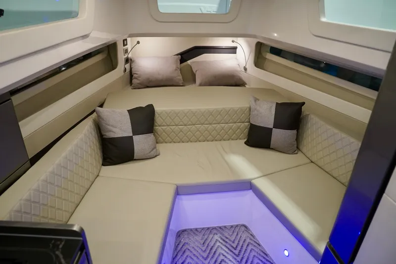  Yacht Photos Pics Luxurious interior of 2025 Schaefer V44 yacht with elegant seating and ambient lighting.