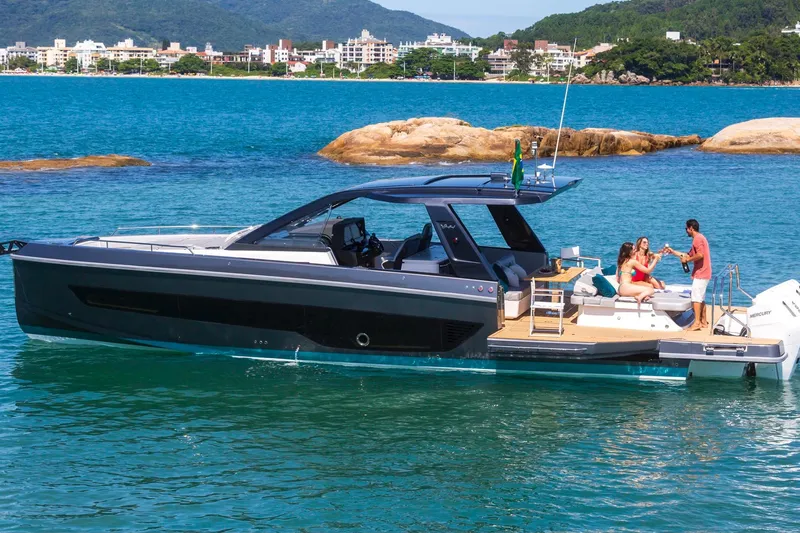  Yacht Photos Pics 2025 Schaefer V44 yacht on water with people enjoying leisure time.