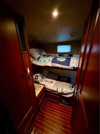 Shameless Yacht Photos Pics Cozy cabin with bunk beds in 1983 Hatteras 46 Convertible yacht.