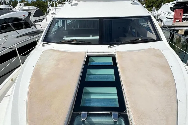  Yacht Photos Pics 2013 Fairline Squadron 42 yacht with sleek design and spacious deck at marina.