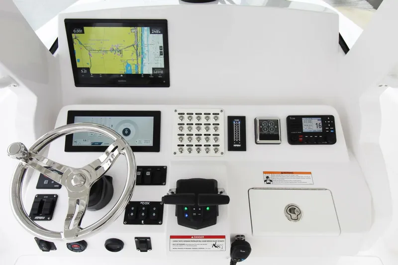  Yacht Photos Pics 2024 Intrepid 375 Nomad SE helm with advanced navigation and control systems.