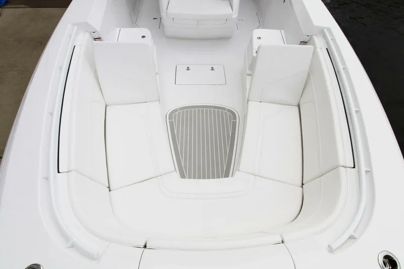  Yacht Photos Pics 2024 Intrepid 375 Nomad SE boat interior with white seating and deck.