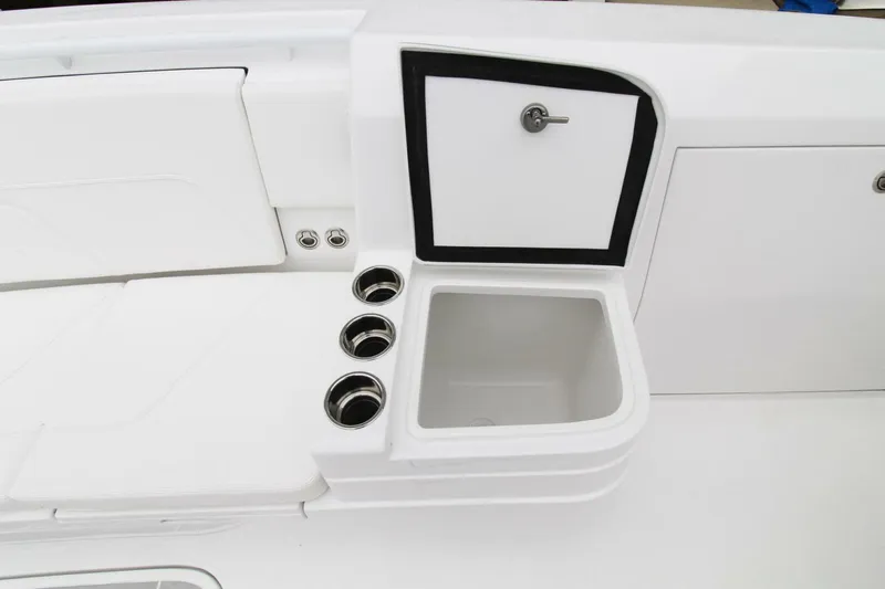  Yacht Photos Pics 2024 Intrepid 375 Nomad SE boat interior with sink and storage compartments.