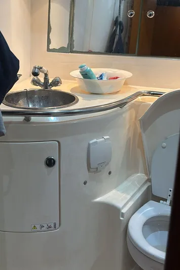 Sv Magi Yacht Photos Pics Bathroom interior of 2000 X-Yachts 442 MK II with sink and toilet.