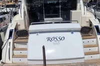 2007 Astondoa 53 Open yacht docked at marina, rear view with "ROSSO UNO" nameplate.