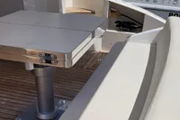 Astondoa 53 Open 2007 yacht interior with sleek seating and table.