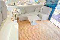 Luxurious interior of 2007 Astondoa 53 Open yacht with sleek seating and wooden flooring.
