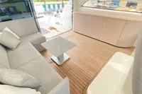 Luxurious interior of 2007 Astondoa 53 Open yacht with modern seating and wooden flooring.