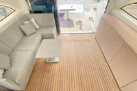 Luxurious interior of 2007 Astondoa 53 Open yacht with elegant seating and wooden flooring.