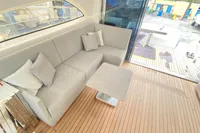 Luxurious interior of 2007 Astondoa 53 Open yacht with elegant seating and wooden flooring.