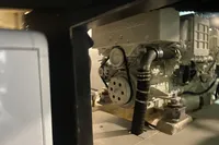 Engine room of 2007 Astondoa 53 Open yacht, showcasing mechanical components.
