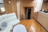Luxurious interior of 2007 Astondoa 53 Open yacht with modern furnishings and wooden flooring.