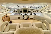 Cockpit of 2007 Astondoa 53 Open yacht with modern controls and plush seating.