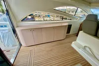 Interior of 2007 Astondoa 53 Open yacht with wooden flooring and modern cabinetry.